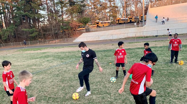 Former Atlanta United player Greg Garza works with players from Georgia Alliance FC during a recent training session.