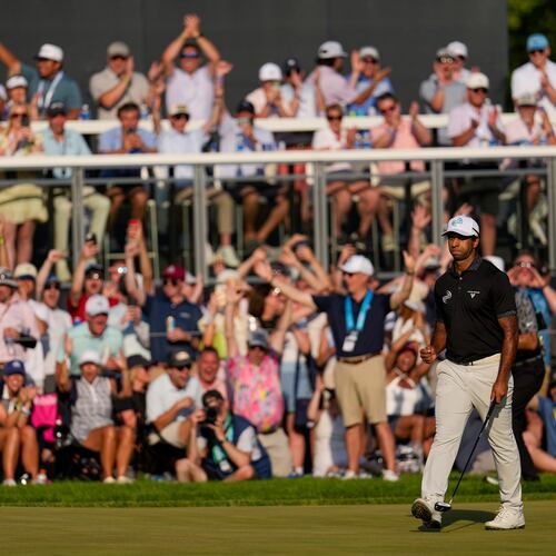 Aaron Rai, of England, celebrates after his shot on the 17th green during the final round of the PGA Championship golf tournament at Aronimink Golf Club, Sunday, May 17, 2026, in Newtown Square, PA. (AP Photo/Carolyn Kaster)