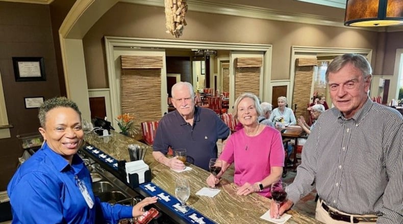 Bartender Afi Jones (from left) and Park Springs Foundation Board members Ross Lenhart, Missy Vanderbilt and Jim Stark. Park Springs retirement community formed a nonprofit to assist employees and their families with educational financial support. Courtesy of Cristina Anderson