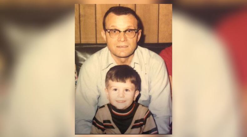 Keith Dooley holds grandson Kevin Whaley.