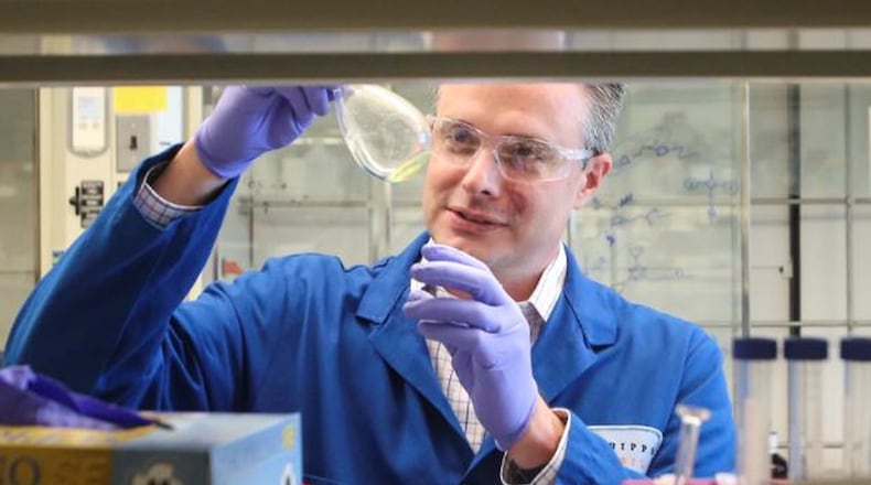 In this photo a scientist in Florida, Matthew Disney, works on potential cures for neurodegenerative diseases like ALS. In an unrelated study, the CDC in July announced a link between certain professions and mortality from ALS and Parkinson’s disease. (Bruce Bennett/Palm Beach Post)