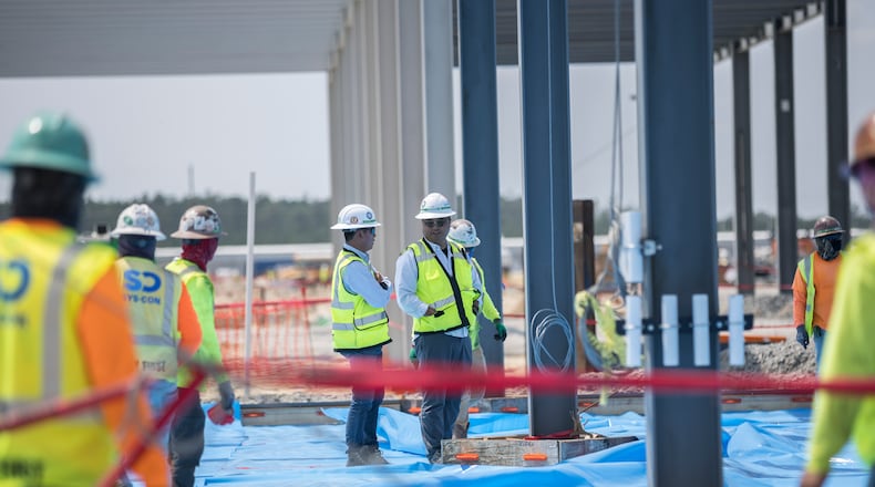 ELLABELL, GA. - JUNE 5, 2023: Workers prepare to pour the concrete floor of the assembly building on the Hyundai Metaplant site, Monday, July 5, 2023, in Ellabell, Ga. (AJC Photo/Stephen B. Morton)