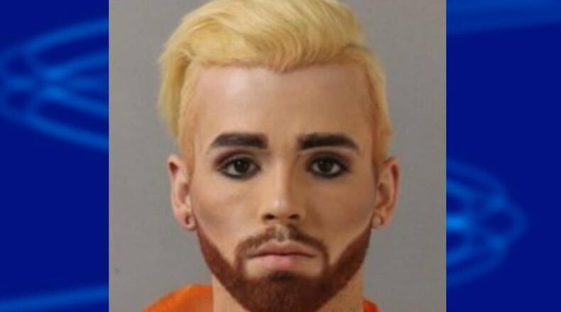 Julian R. Mitchell was arrested Thursday night.