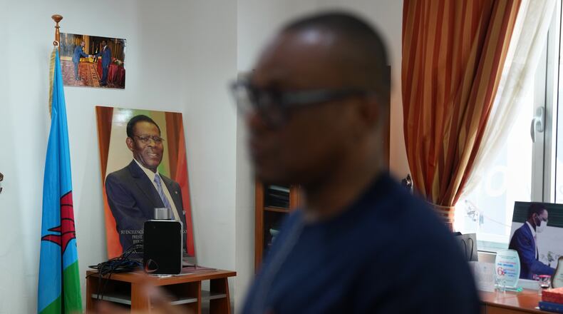 Framed portraits of Equatorial Guinea President, Teodoro Obiang Nguema Mbasogo, displayed in an office setting in Malabo, Equatorial Guinea, Friday, April 24, 2026. (AP Photo/Misper Apawu)