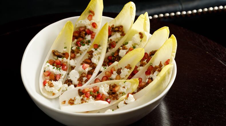 Endive nachos at Bar Margot provide the crunch, cheese and flavorful toppings you expect, while keeping things fresh and light. Courtesy of Patrick Heagney/Bar Margot