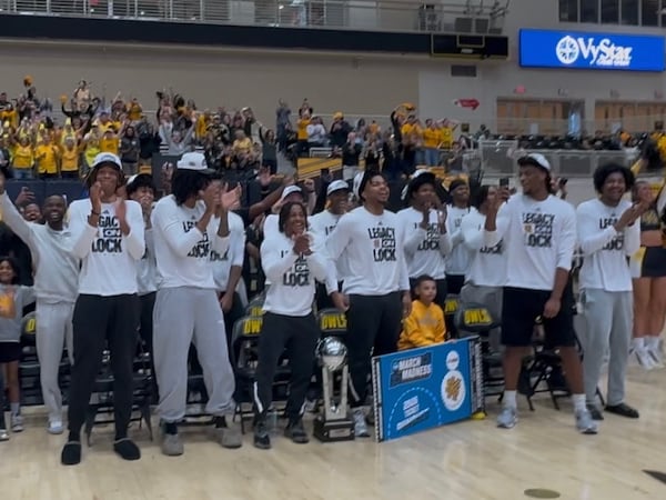 The Kennesaw State men's basketball team celebrates its spot in the NCAA tournament at a watch party at the school's VyStar Arena on March 15, 2026. (Ken Sugiura/AJC)