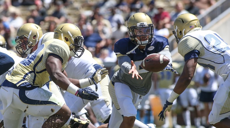Georgia Tech quarterback Justin Thomas (5) pitches the ball during the spring game at Bobby Dodd Stadium Saturday, April 23, 2016. BRANDEN CAMP/SPECIAL