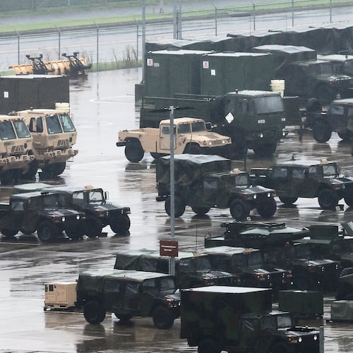 U.S. military vehicles are parked at Camp Humphreys in Pyeongtaek, South Korea, Friday, Aug. 21, 2026. (Hong Ki-won/Yonhap via AP)