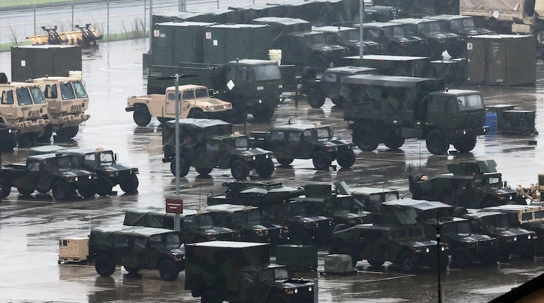 U.S. military vehicles are parked at Camp Humphreys in Pyeongtaek, South Korea, Friday, Aug. 21, 2026. (Hong Ki-won/Yonhap via AP)
