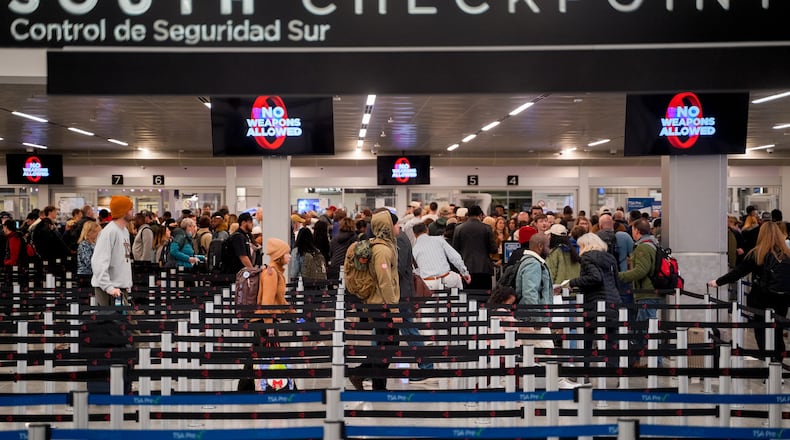 Post holiday travelers descend on Atlanta's Hartsfield-Jackson International Airport on Friday, December 27, 2024 (Ben Hendren for The Atlanta Journal-Constitution)