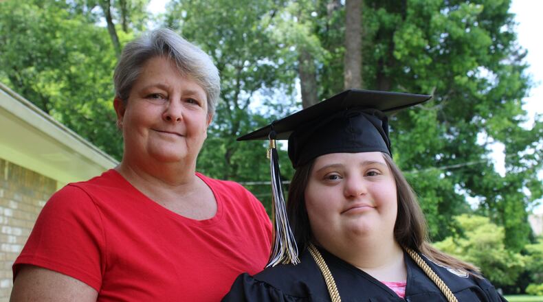 Ashlynn Rich, right, poses with her mother, Linda Ramirez. Ashlynn graduated from Sprayberry High School in May and was excluded from the full ceremony along with other special needs students. (Photo Courtesy of Annie Mayne)