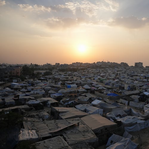 A tent camp for displaced Palestinians stretches along Zawaida in the central Gaza Strip on Tuesday, Nov. 4, 2025. (AP Photo/Abdel Kareem Hana)