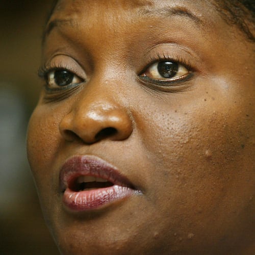 FILE - Liberian first lady Jewel Howard Taylor speaks to journalists at the ruling National Patriotic Party headquarters in the Liberian capital Monrovia Friday, July 11, 2003. (AP Photo/Ben Curtis,File)