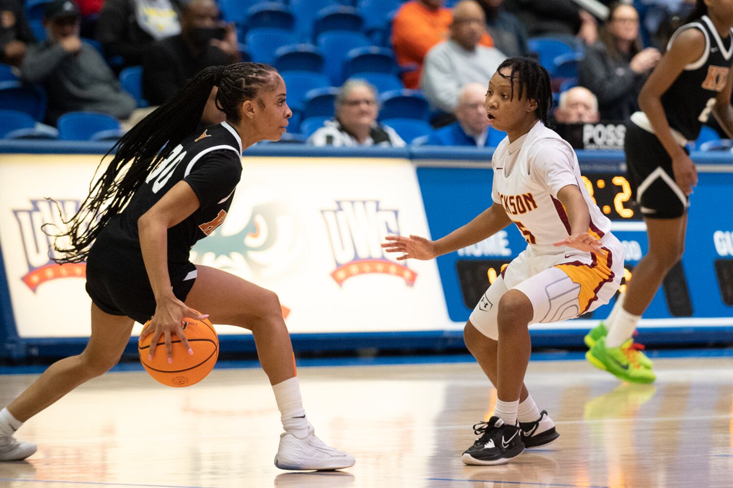 Crystal Henderson of Kell attempts to take the ball past Jackson's Maya Whitehead. Jamie Spaar for the Atlanta Journal-Constitution