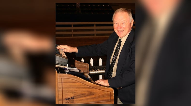 Dale Stone Jr. sold office supplies by day, but the job he loved most was playing the organ for Atlanta Hawks games and also for the Braves .