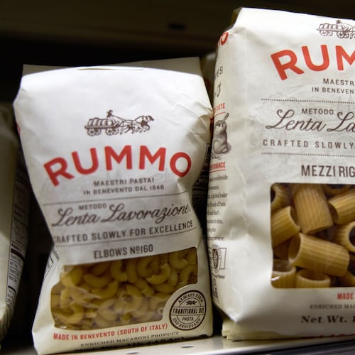 Packages of imported Italian pasta sit on shelves Tuesday, Nov. 11, 2025, in Detroit. (AP Photo/Ryan Sun)
