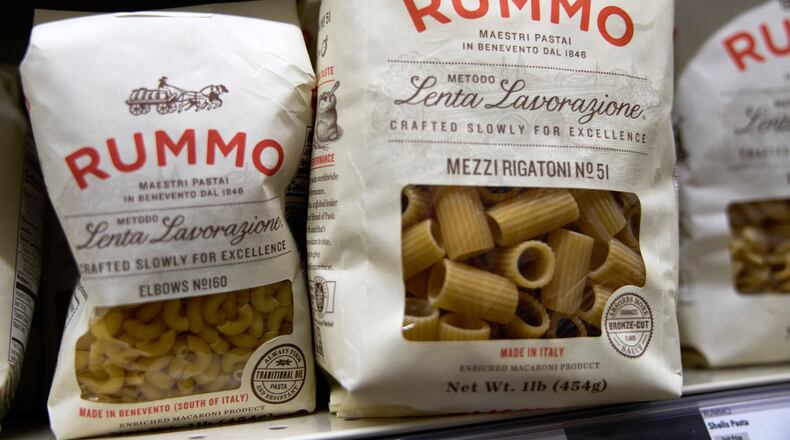 Packages of imported Italian pasta sit on shelves Tuesday, Nov. 11, 2025, in Detroit. (AP Photo/Ryan Sun)