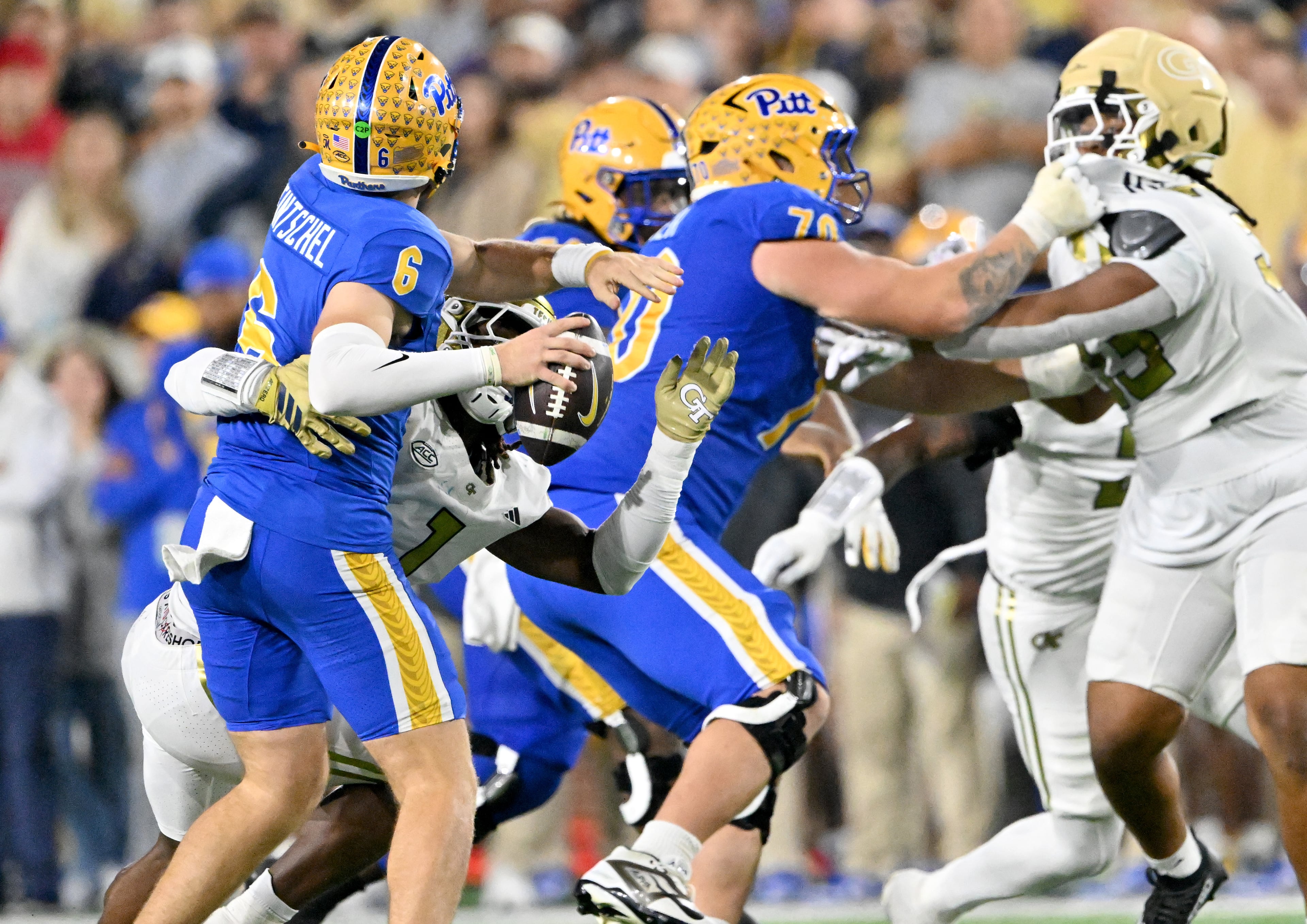 Georgia Tech linebacker Cayman Spaulding (1) sacks Pittsburgh quarterback Mason Heintschel (6) during the second half in an NCAA college football game at Bobby Dodd Stadium, Saturday, November 22, 2025 in Atlanta. Pittsburgh won 42-28 over Georgia Tech. (Hyosub Shin / AJC)