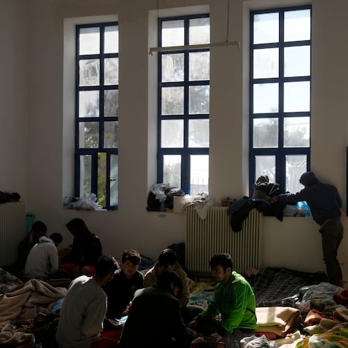 FILE - Migrants, most of them from Afghanistan, rest at an old school used as a temporary shelter on the island of Kythira, southern Greece, Oct. 7, 2022. (AP Photo/Thanassis Stavrakis, File)