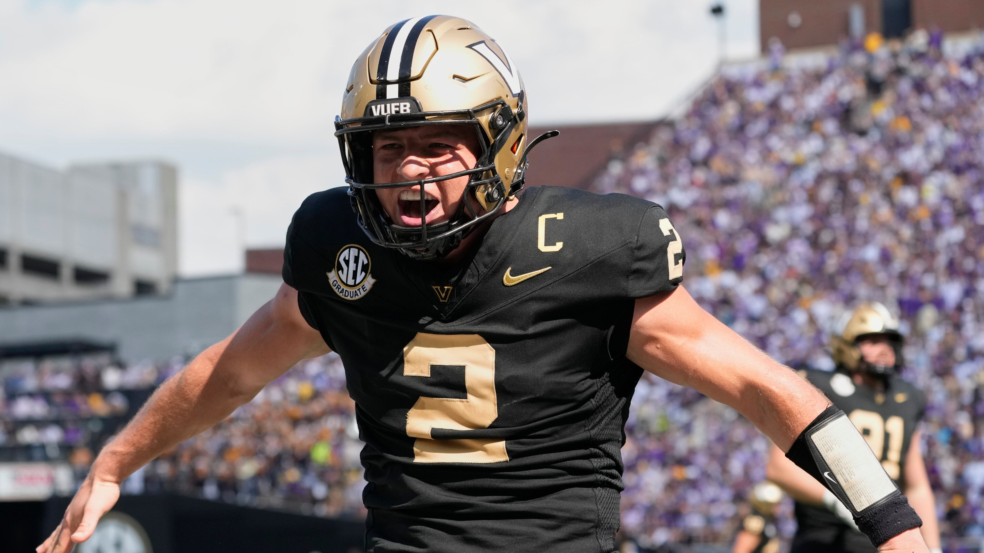 FILE - Vanderbilt quarterback Diego Pavia (2) celebrates a touchdown during the second half of an NCAA college football game against LSU, Saturday, Oct. 18, 2025, in Nashville, Tenn. (AP Photo/George Walker IV, File)