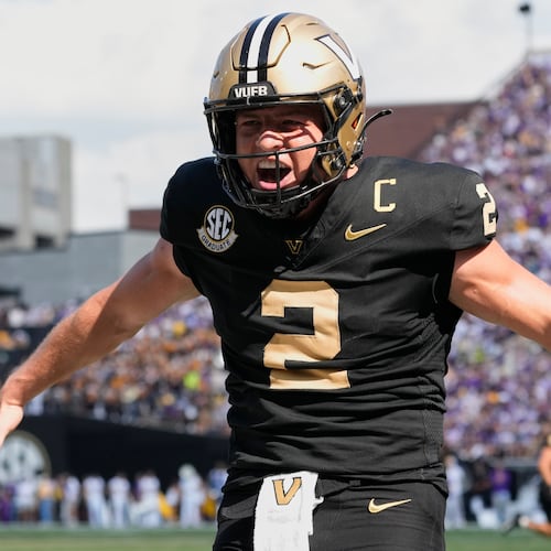 FILE - Vanderbilt quarterback Diego Pavia (2) celebrates a touchdown during the second half of an NCAA college football game against LSU, Saturday, Oct. 18, 2025, in Nashville, Tenn. (AP Photo/George Walker IV, File)