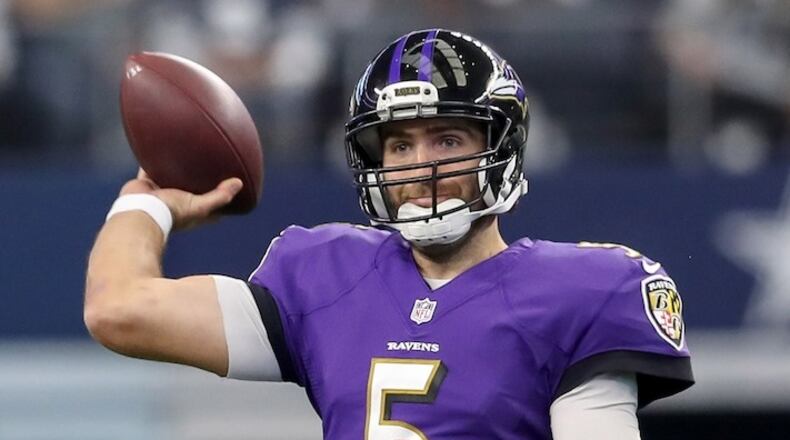 Baltimore Ravens quarterback Joe Flacco attempts a pass against the Dallas Cowboys on November 20, 2016, at AT&T Stadium in Arlington, Texas. (Steve Nurenberg/Fort Worth Star-Telegram/TNS)