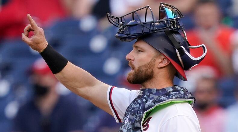 Washington Nationals catcher Jonathan Lucroy gestures in the seventh inning of an opening day against the Atlanta Braves at Nationals Park, Tuesday, April 6, 2021, in Washington. (Alex Brandon/AP)