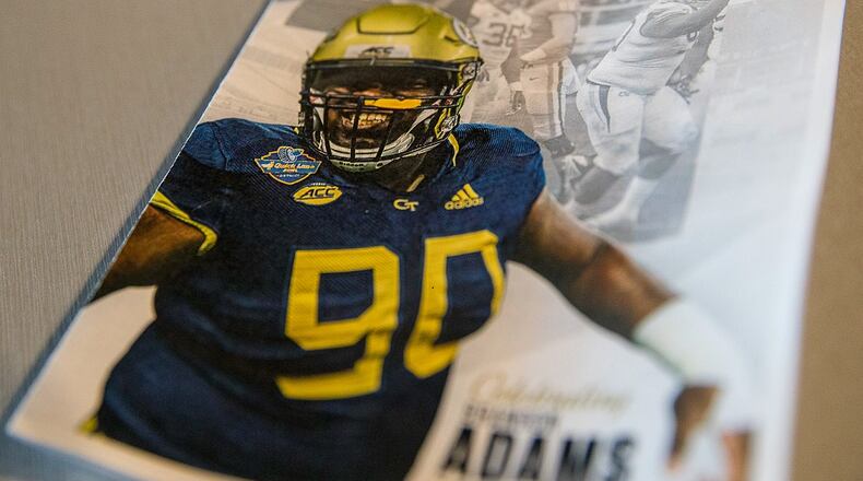 A service program for late Georgia Tech football player Brandon Adams is displayed before a memorial service at McCamish Pavilion in Atlanta, Monday, March 25, 2019.  (ALYSSA POINTER/ALYSSA.POINTER@AJC.COM)