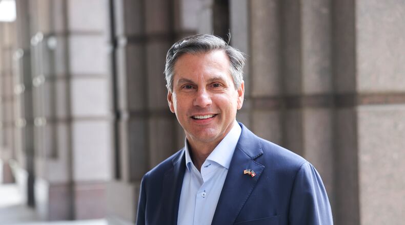 Derek Dooley, a Republican candidate for the U.S. Senate, poses for a portrait in Atlanta on Thursday, March 12, 2026. (Arvin Temkar/AJC)