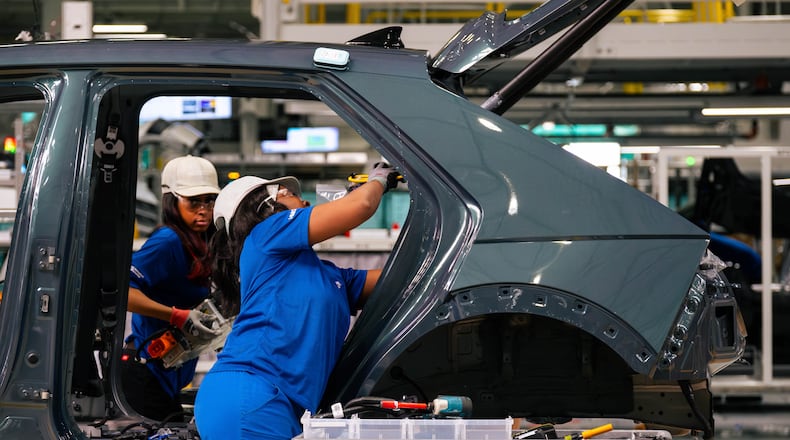 Metapros assemble parts on the IONIQ 5 electric car at the Hyundai Metaplant in Bryan County, GA on March 26, 2025.  (Justin Taylor/The Current GA)