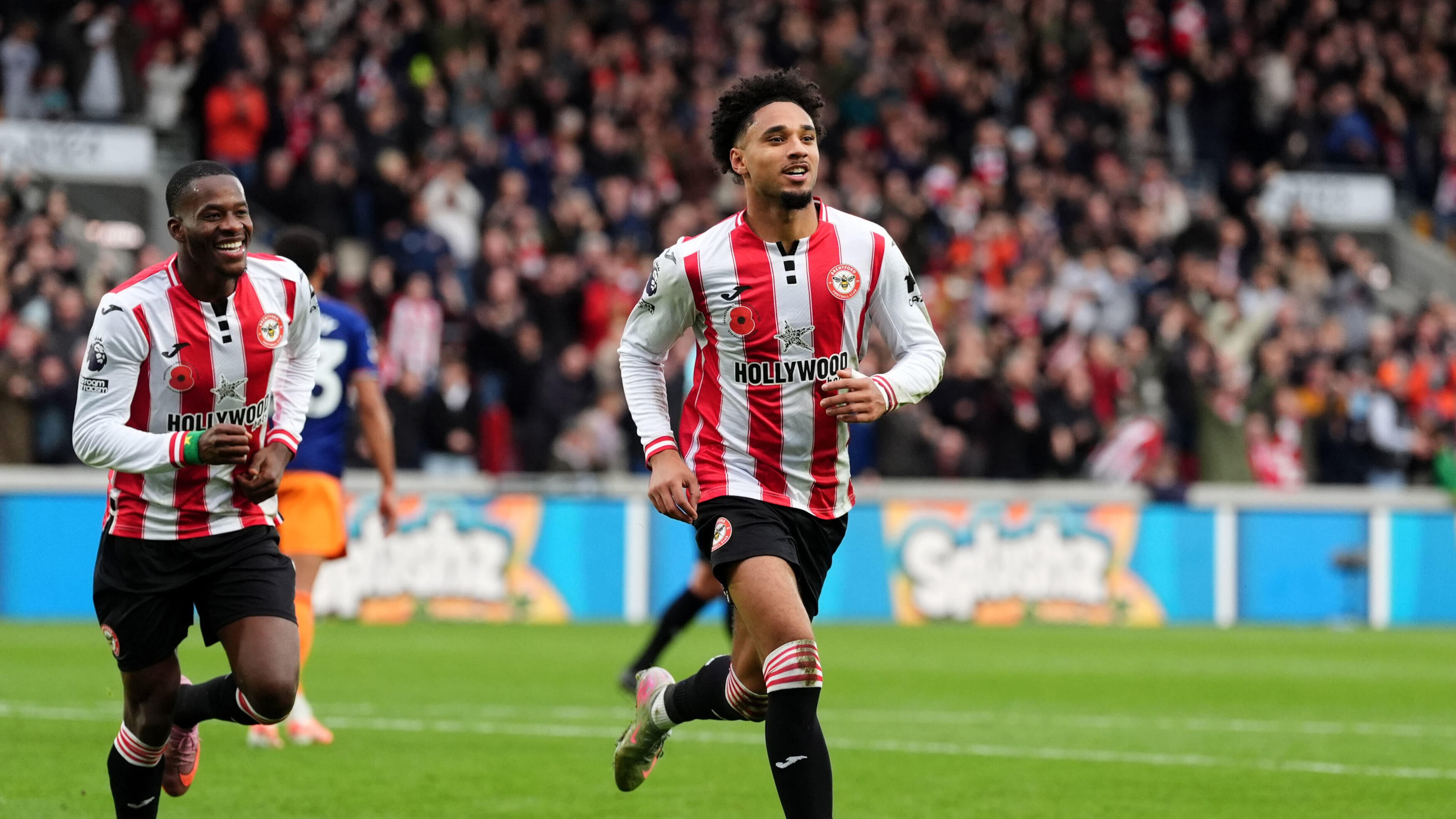 Brentford's Kevin Schade celebrates scoring their side's first goal during the English Premier League soccer match between Brentford and Newcastle United in London, Sunday, Nov. 9, 2025. (Adam Davy/PA via AP)