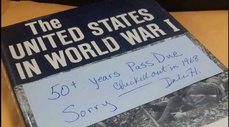 A Cobb County man returned a library book that was 50 years overdue to a Kentucky library.