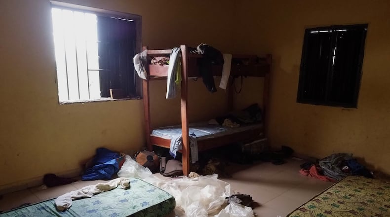 Students' belongings are seen inside a dormitory of an orphanage that was raided by gunmen late Sunday, in Lokoja, Nigeria, Monday, April 27, 2026. (AP Photo/Haruna Yahaya)