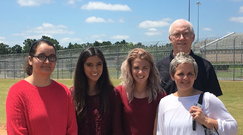 Professors Ronald H. Aday and Meredith Huey Dye stand with graduate students Mary De La Torre (from left), Nicole Cook and Alisha Wray outside Pulaski Women’s Prison in Georgia. CONTRIBUTED