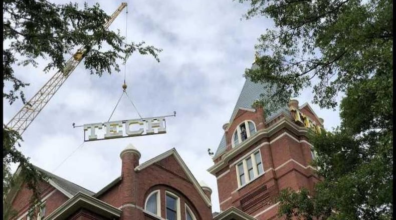 A crane lifts the new “TECH” sign that has been placed on the tower on Georgia Tech’s campus. Photo Credit: Georgia Tech