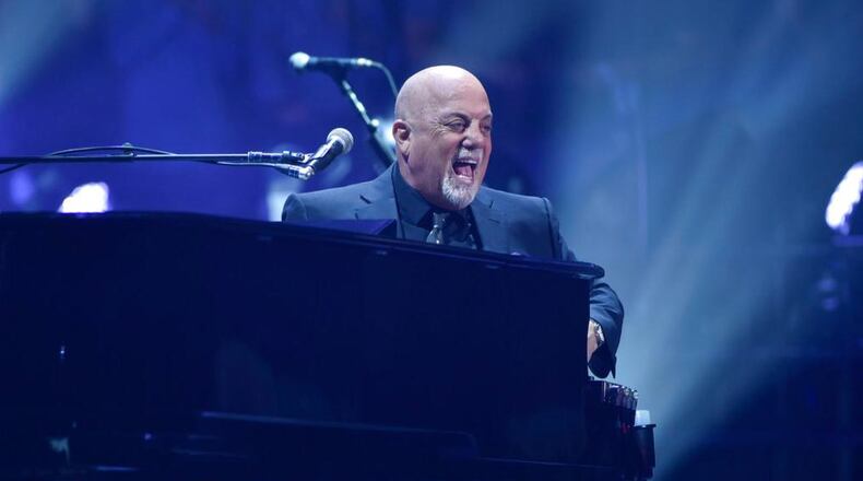 Musician Billy Joel performs during his 100th lifetime performance at Madison Square Garden on Wednesday, July 18, 2018, in New York. (Photo by Evan Agostini/Invision/AP)
