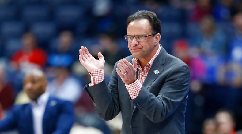 Georgia head coach Tom Crean watches the action in the first half of an NCAA college basketball game against Mississippi in the Southeastern Conference Tournament Wednesday, March 11, 2020, in Nashville, Tenn. (AP Photo/Mark Humphrey)