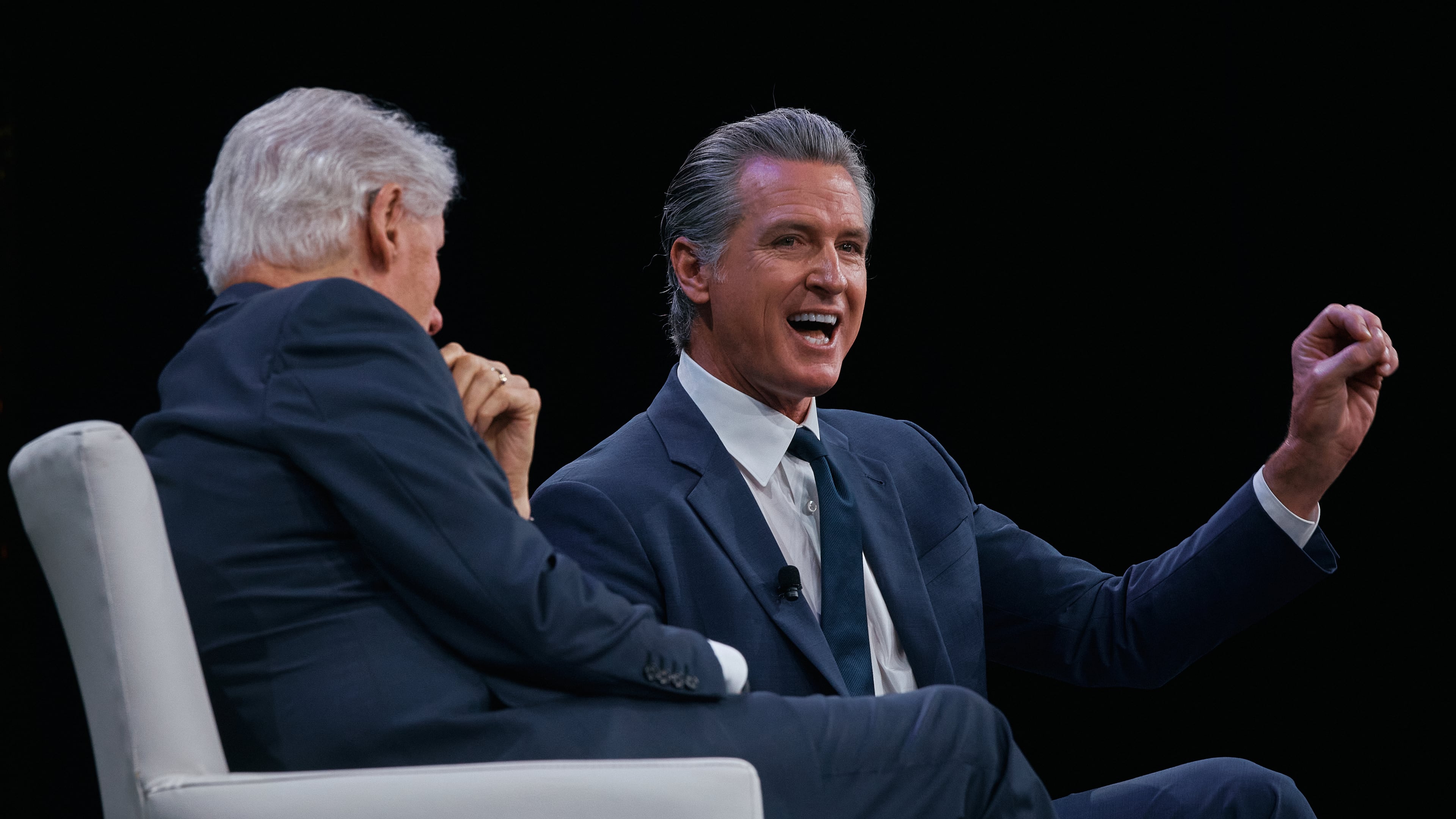 Governor of California Gavin Newsom, right, speaks next to former U.S. President Bill Clinton, left, during the Clinton Global Initiative on Wednesday, Sept. 24, 2025, in New York. (AP Photo/Andres Kudacki)
