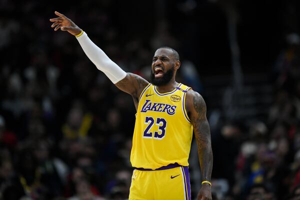 Los Angeles Lakers' LeBron James (23) yells to teammates during the first half of an NBA basketball game against the Chicago Bulls Thursday, March 27, 2025, in Chicago. (AP Photo/Paul Beaty)