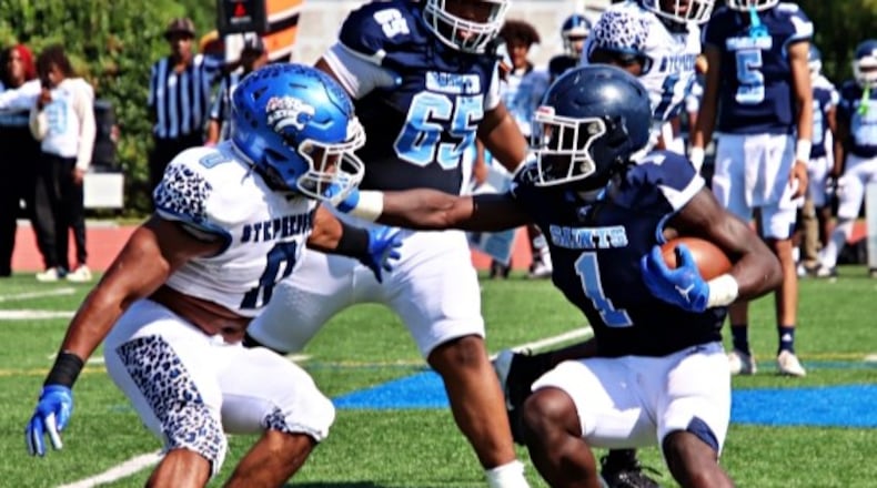 Stephenson's Romando Craddock (left), a defensive end in 2023 who is playing middle linebacker and tight end this season, makes a tackle against Cedar Grove in a game on Oct. 5, 2024.
