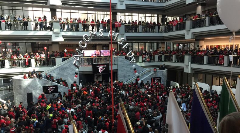 Atlanta Falcons fans fill Atlanta City Hall to capacity on Friday during a pep rally for the Super Bowl-bound team. LEON STAFFORD/AJC.