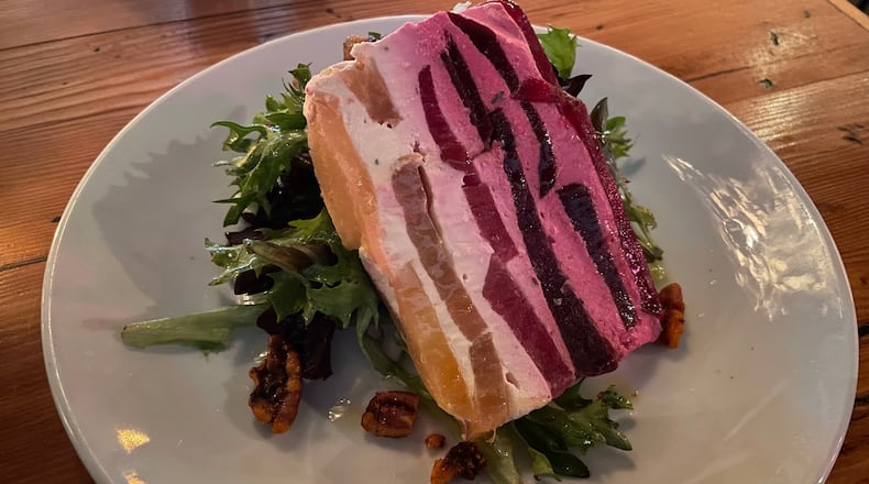 The beet terrine served at Kindred in the Oak Grove neighborhood offers softness, crunch, sweetness and tang. Angela Hansberger for The Atlanta Journal-Constitution