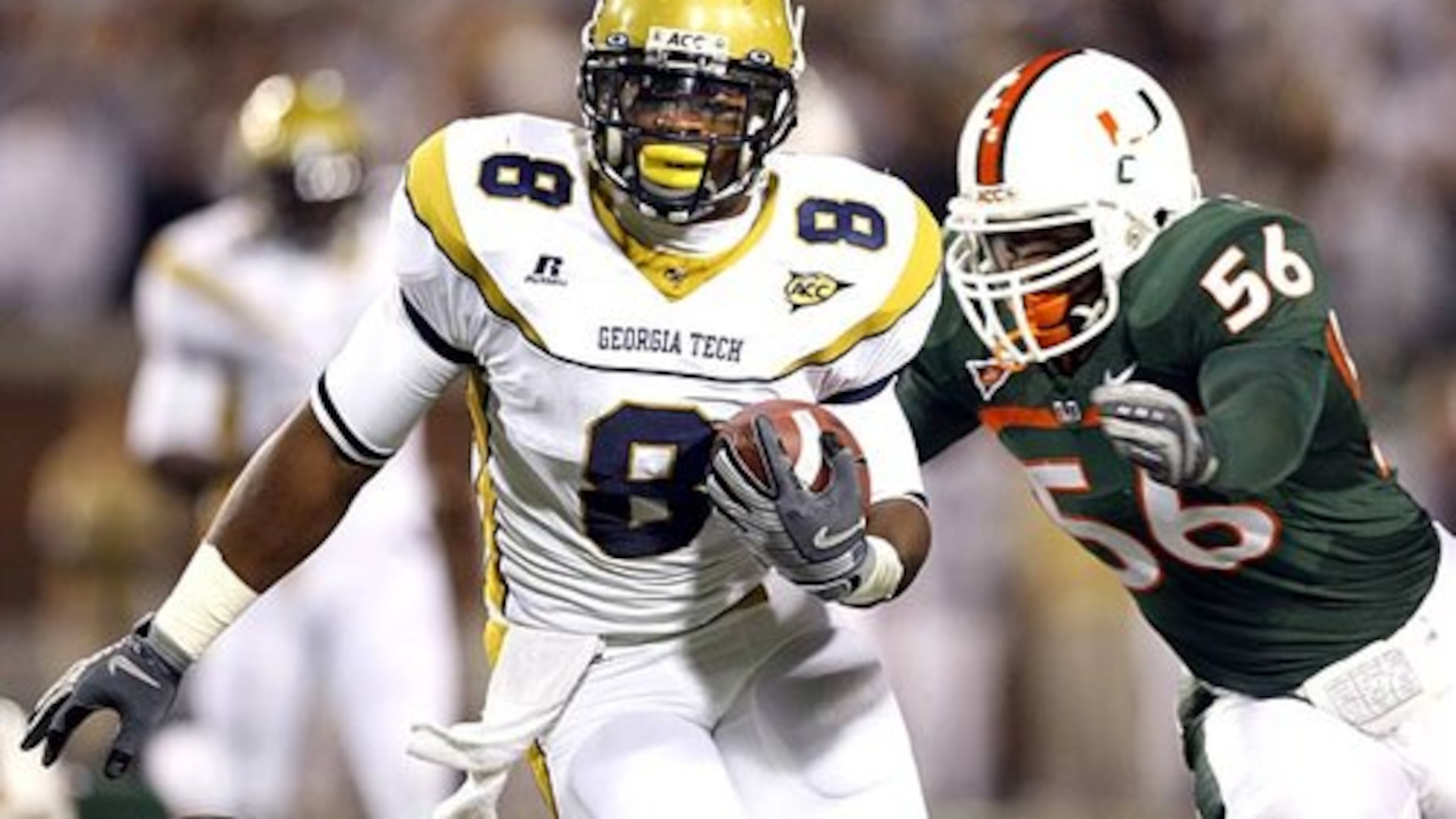 Georgia Tech wide receiver Demaryius Thomas (8) runs in the first quarter as Miami linebacker Marcus Robinson (56) tries to make the tackle. (File)