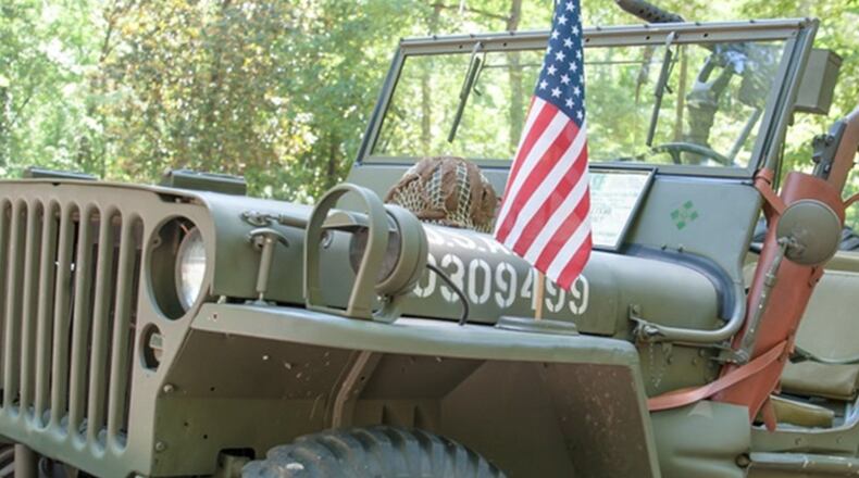 Georgia Veterans Day Parade. 11:11 a.m. Saturday. Begins on Peachtree Street south of Ralph McGill / Ivan Allen Boulevard and ends at Centennial Olympic Park Drive and Marietta Street. The parade’s reviewing stand will be on Baker Street between the World of Coca Cola and Georgia Aquarium, where parking will be available along with other paid lots. Grand Marshal will be General George W. Casey Jr., U.S. Army (retired), now a lecturer on leadership. GaVetsDayParade.org. Courtesy of Atlanta History Center