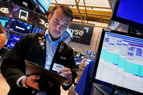 Dylan Halvorsan works on the floor of the New York Stock Exchange, Tuesday, May 27, 2025. (AP Photo/Richard Drew)