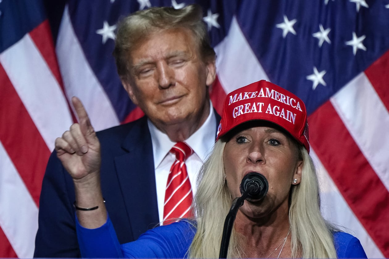 U.S. Rep. Marjorie Taylor Greene (right) speaks alongside President Donald Trump during his campaign event in Rome on March 9, 2024. (Elijah Nouvelage/TNS 2024)