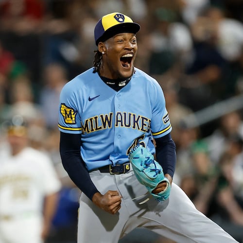 Milwaukee Brewers relief pitcher Abner Uribe (45) reacts after striking out the final batter to end the inning during the eleventh inning of a baseball game against the Athletics, Monday, June 8, 2026, in Las Vegas. (AP Photo/Caroline Brehman)