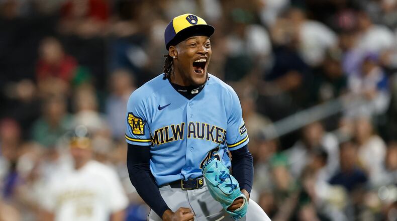 Milwaukee Brewers relief pitcher Abner Uribe (45) reacts after striking out the final batter to end the inning during the eleventh inning of a baseball game against the Athletics, Monday, June 8, 2026, in Las Vegas. (AP Photo/Caroline Brehman)