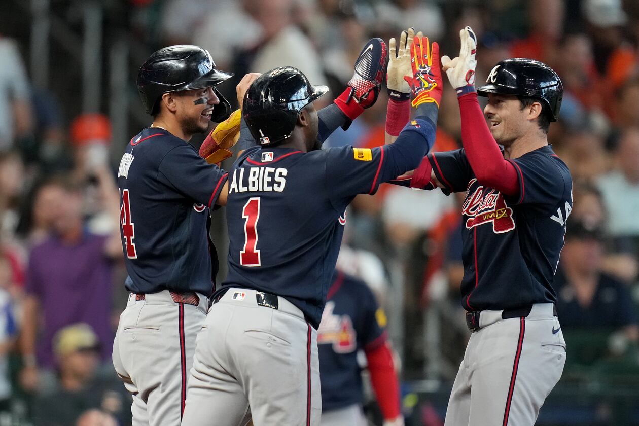 Atlanta Braves' Mike Yastrzemski (right) celebrates after his three-run home run with Mauricio Dubon (left) and Ozzie Albies (center) during the sixth inning of a baseball game against the Houston Astros, Sunday, Sept. 20, 2026, in Houston. (Karen Warren/AP)