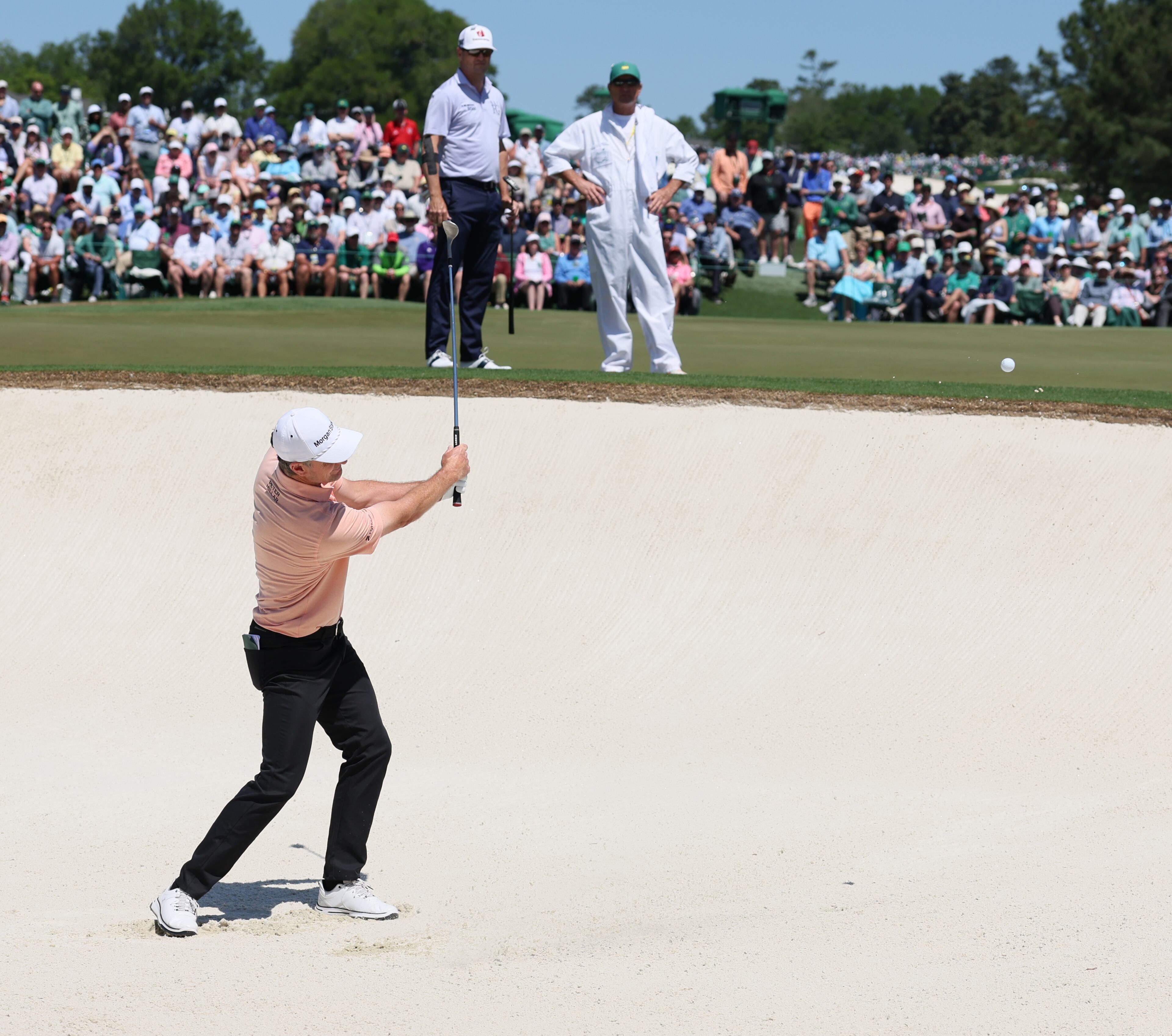 Justin Rose hits out of bunker on second hole during final round of the Masters golf tournament, at Augusta National Golf Club, Saturday, April 13, 2025, in Augusta, Ga. (Jason Getz / AJC)